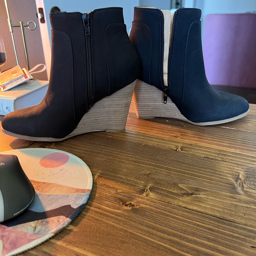 Ccocci size 7 black wedge booties.